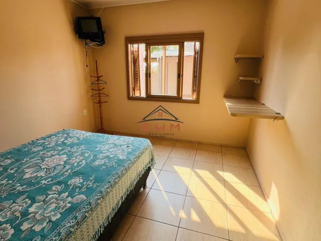 Imagem 4: Casa de esquina toda Mobiliada à venda em Torres - 4 Dormitórios, Churrasqueira e