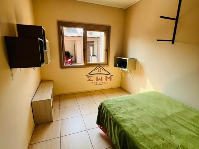 Imagem 5: Casa de esquina toda Mobiliada à venda em Torres - 4 Dormitórios, Churrasqueira e