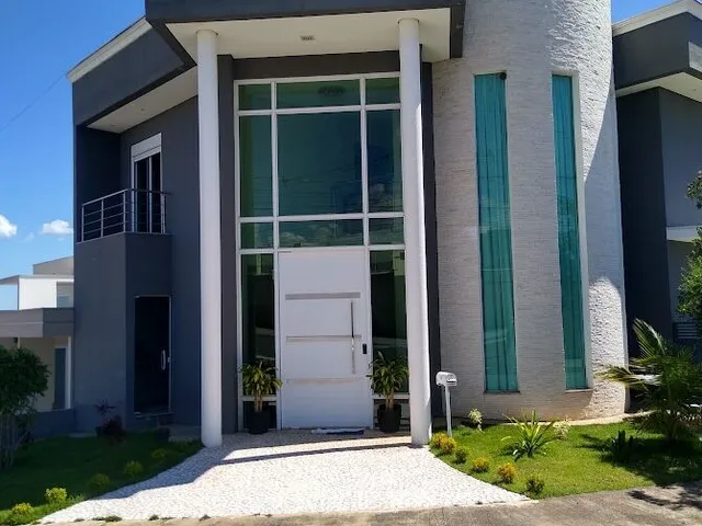 Imagem: A casa em condomínio possui 3 Dormitórios, 3 Suítes, 3