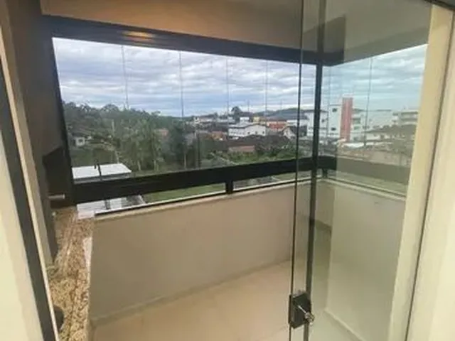 Imagem: O apartamento possui 2 Dormitórios, 1 Banheiro, 2 Vagas na