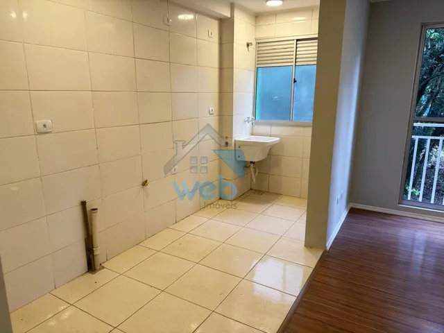 Imagem 9: Apartamento com dois quartos, sala ampla, laminados