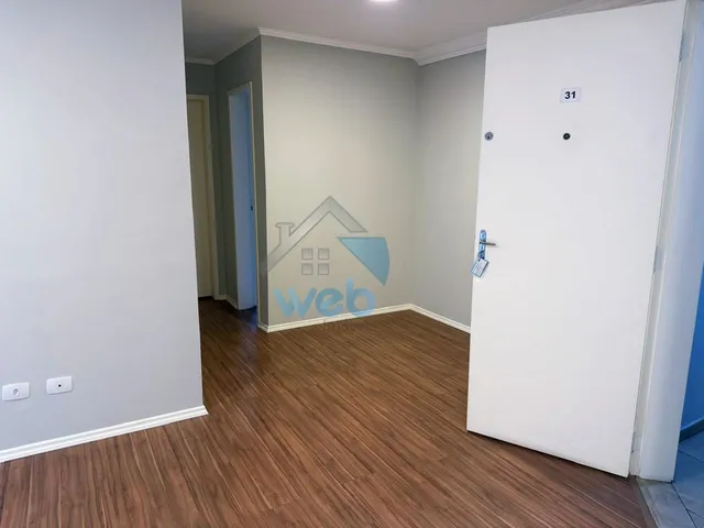 Imagem 10: Apartamento com dois quartos, sala ampla, laminados
