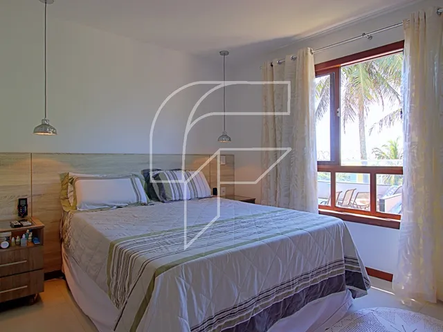 Imagem 4: Ampla casa linear completa com 4 suítes e área de lazer com piscina na Enseada Azul