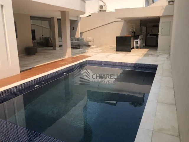 Imagem: A casa em condomínio possui 4 Dormitórios, 3 Suítes, 4