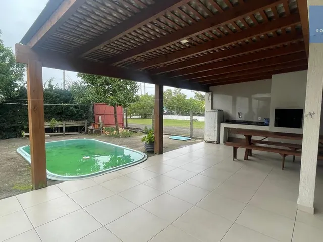Imagem 2: Casa com piscina muito bem localzada