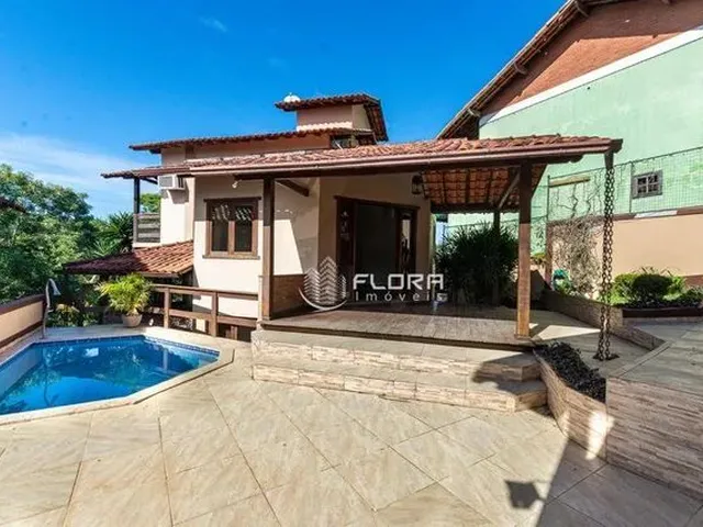 Imagem: A casa em condomínio possui 3 Dormitórios, 3 Suítes, 4