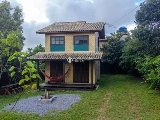 Imagem: A casa possui 2 Dormitórios, 1 Banheiro, 60m² de Área e