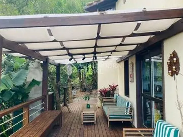 Imagem: A casa em condomínio possui 4 Dormitórios, 2 Suítes, 1