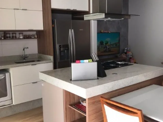 Imagem: O apartamento possui 2 Dormitórios, 1 Suíte, 2 Banheiros,