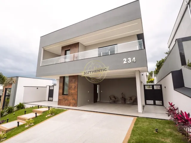 Imagem: A casa em condomínio possui 3 Dormitórios, 3 Suítes, 4