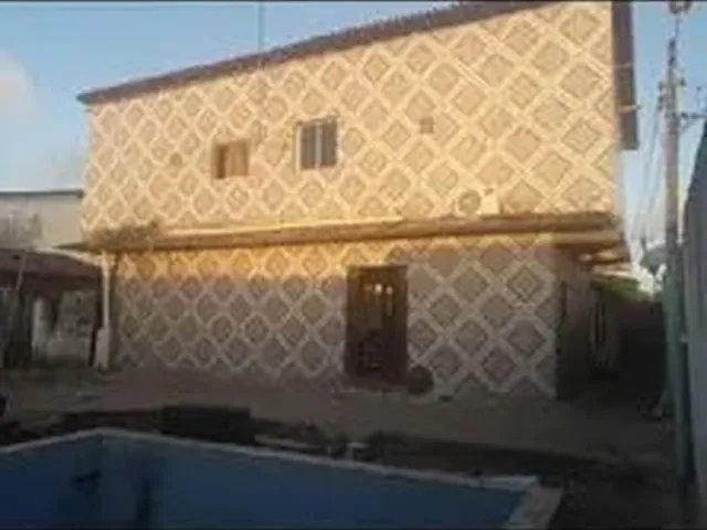 Imagem: A casa possui 5 Dormitórios, 4 Banheiros, 3 Vagas na