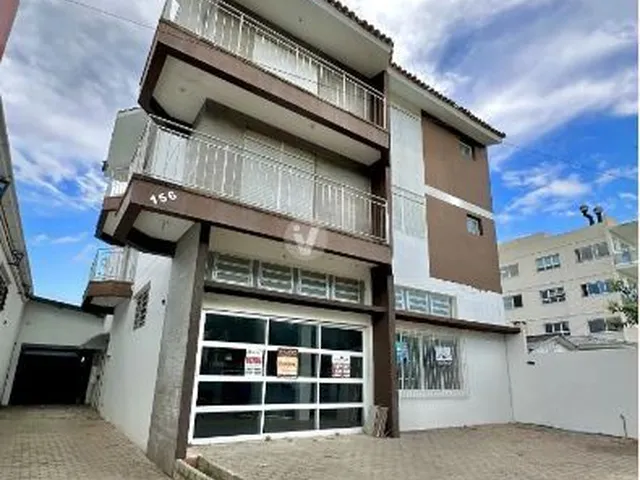 Imagem: O apartamento possui 2 Dormitórios, 1 Suíte, 1 Banheiro,