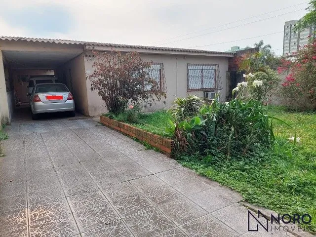Imagem: CASA NA AV BORGES DE MEDEIROS COM ÁREA