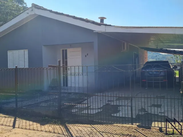 Imagem 7: Casa com 3 dormitórios, 2 banheiros, sala de estar social integrada com a cozinh