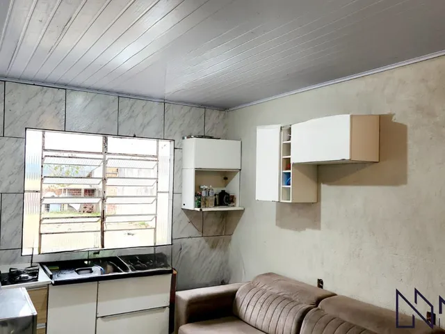 Imagem 2: Casa com 3 dormitórios, 2 banheiros, sala de estar social integrada com a cozinh