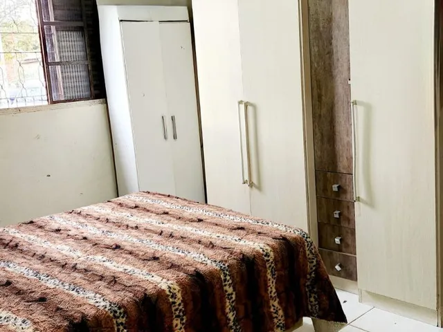 Imagem 12: Casa com 3 dormitórios, 2 banheiros, sala de estar social integrada com a cozinh