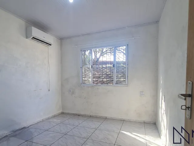 Imagem 5: Casa com 3 dormitórios, 2 banheiros, sala de estar social integrada com a cozinh