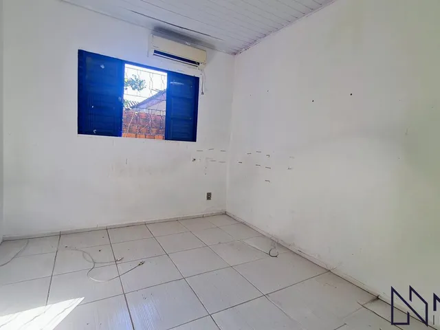 Imagem 3: Casa com 3 dormitórios, 2 banheiros, sala de estar social integrada com a cozinh