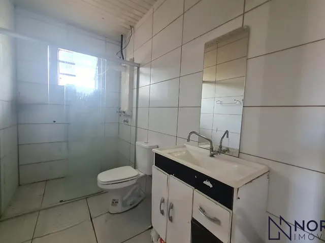 Imagem 8: Casa com 3 dormitórios, 2 banheiros, sala de estar social integrada com a cozinh