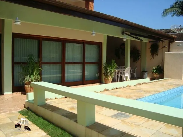 Imagem: A casa em condomínio possui 4 Dormitórios, 3 Suítes, 4