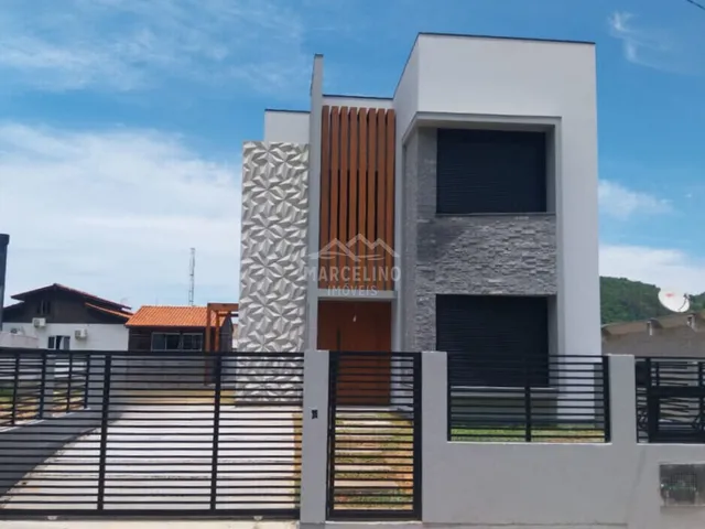Imagem: A casa possui 3 Dormitórios, 2 Suítes, 3 Banheiros,