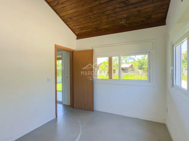 Imagem 14: Casa próxima a lagoa e mar na Praia da Ferrugem