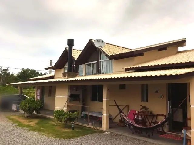Imagem: A casa possui 6 Dormitórios, 4 Banheiros, 540m² de Área,