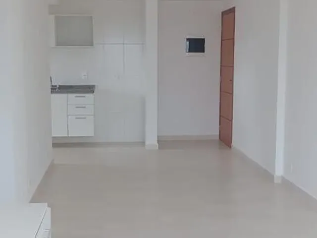 Imagem: O apartamento possui 2 Dormitórios, 1 Suíte, 2 Banheiros,