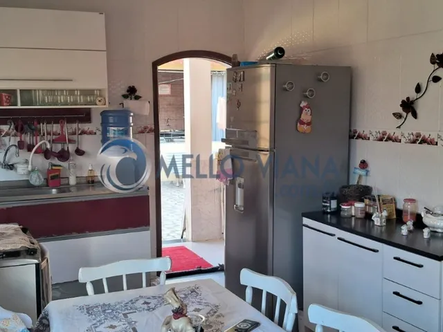 Imagem 15: Casa com 02 suites,02 dormitorios,03 garagens cobertas,01 lavabo em bairro tranguilo em