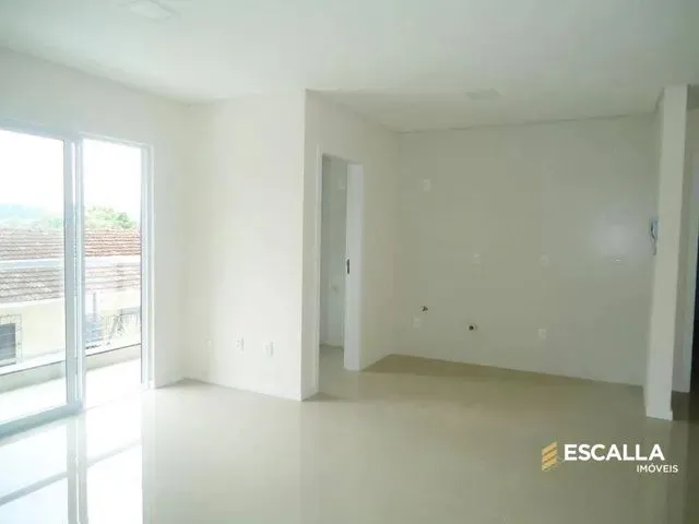 Imagem: O apartamento possui 2 Dormitórios, 1 Suíte, 1 Banheiro,