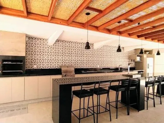 Imagem: A casa em condomínio possui 4 Dormitórios, 5 Banheiros, 4