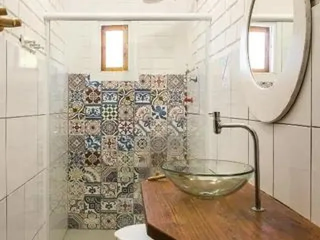 Imagem: A casa possui 3 Dormitórios, 1 Banheiro, 1 Vaga na