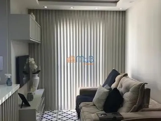 Imagem: O apartamento possui 2 Dormitórios, 1 Suíte, 2 Banheiros,