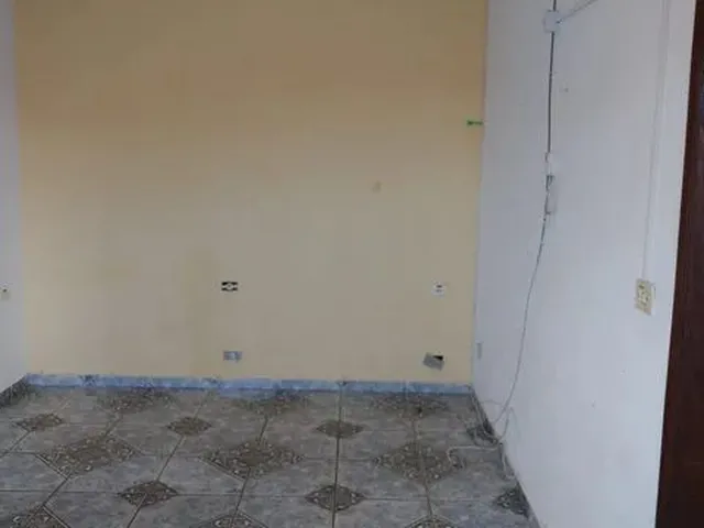 Imagem 2: Kitnet e Uma Casa com Garagem