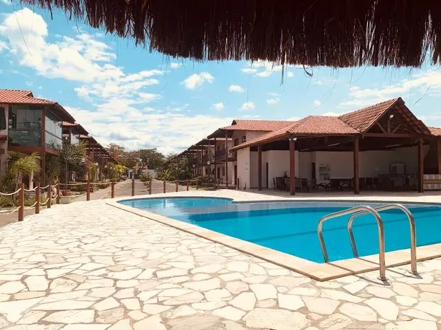 Imagem: A casa em condomínio possui 3 Dormitórios, 2 Suítes, 3