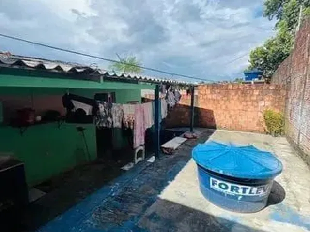 Imagem 2: Casa. Varanda, Área de serviço, 3 Vagas na garageme3 Dormitórios