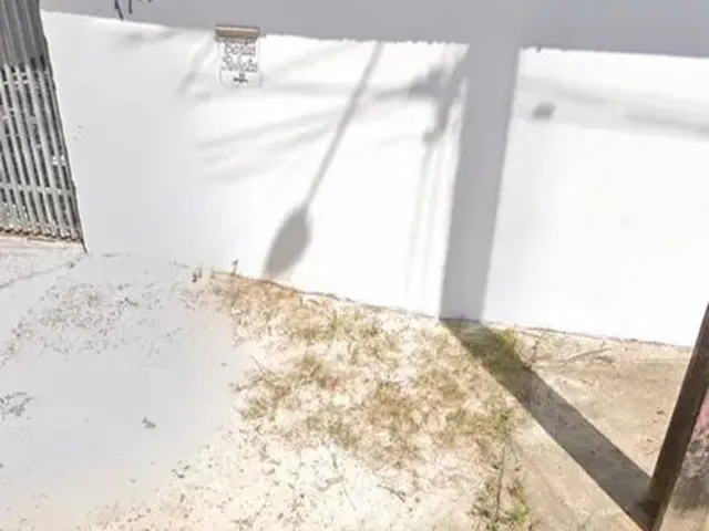 Imagem 6: Casa em Rua Pública