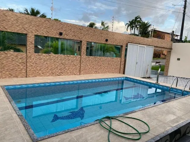 Imagem: A casa possui 5 Dormitórios, 4 Suítes, 5 Banheiros, 5