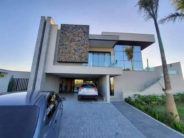 Imagem: A casa possui 4 Dormitórios, 3 Suítes, 5 Banheiros, 4