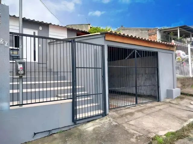 Imagem: A casa possui 2 Dormitórios, 1 Banheiro, 1 Vaga na