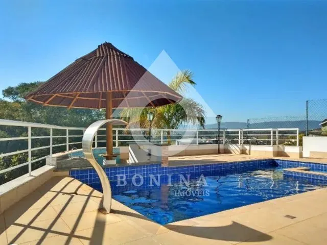 Imagem: A casa possui 5 Dormitórios, 4 Suítes, 5 Banheiros, 5