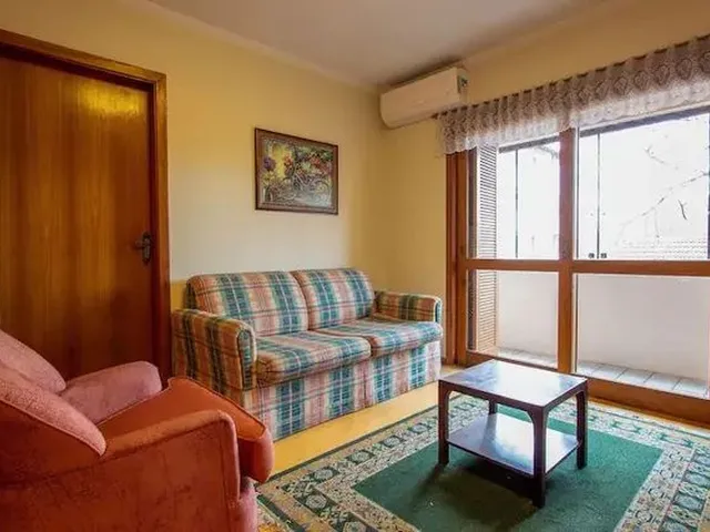 Imagem: O apartamento possui 1 Dormitório, 1 Banheiro, 1 Vaga na