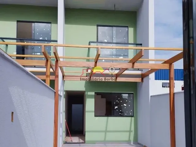 Imagem: A casa possui 2 Dormitórios, 2 Banheiros, 2 Vagas na