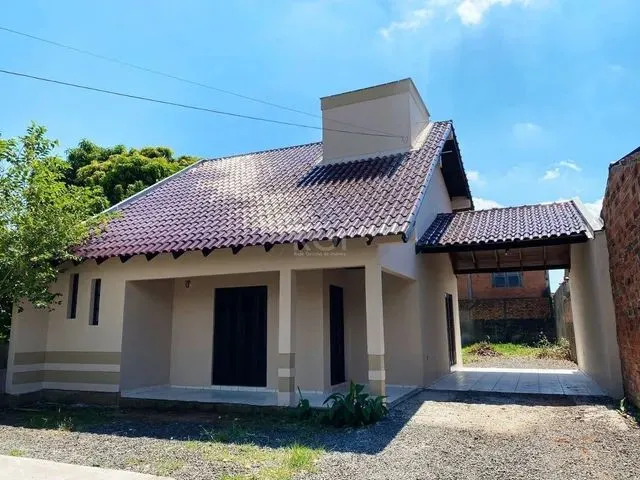 Imagem: A casa possui 2 Dormitórios, 2 Banheiros, 1 Vaga na