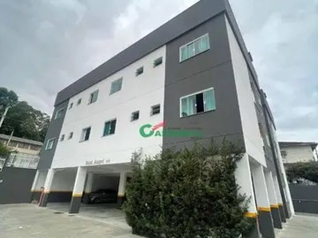 Imagem: O apartamento possui 2 Dormitórios, 1 Suíte, 2 Banheiros,