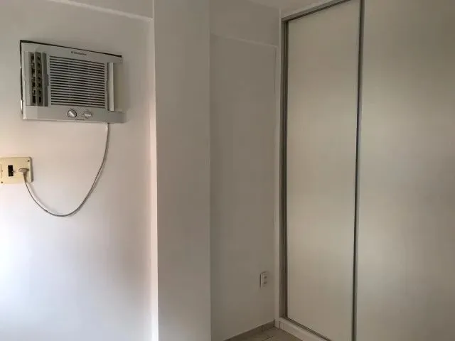 Imagem: O apartamento possui 2 Dormitórios, 1 Suíte, 2 Banheiros,