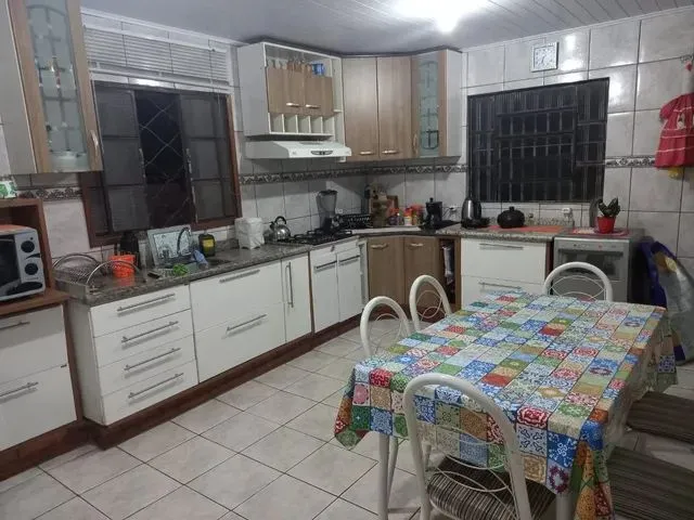 Imagem 11: Vendo Uma Casa Grande com as Mobílias