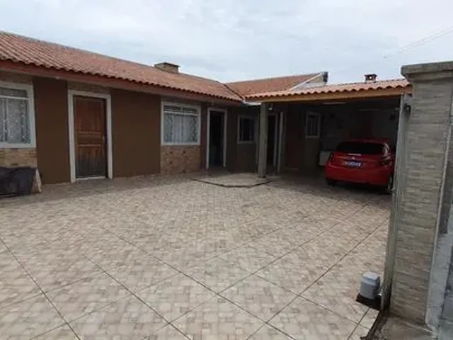 Imagem: A casa possui 2 Dormitórios, 1 Banheiro, 2 Vagas na