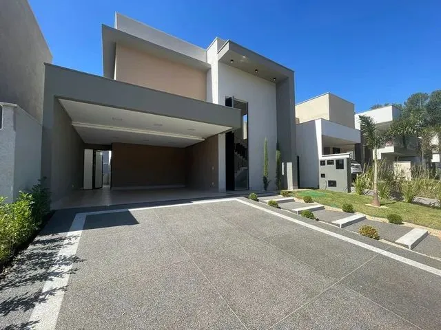 Imagem: A casa em condomínio possui 5 Dormitórios, 4 Suítes, 5