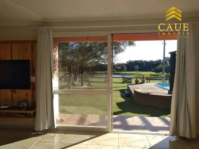 Imagem 3: Casa em Condomínio Fechado com Lagoa